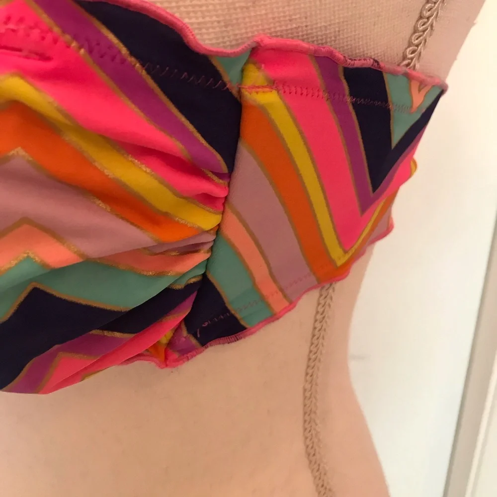 Victoria’s Secret bikini top with gold trim